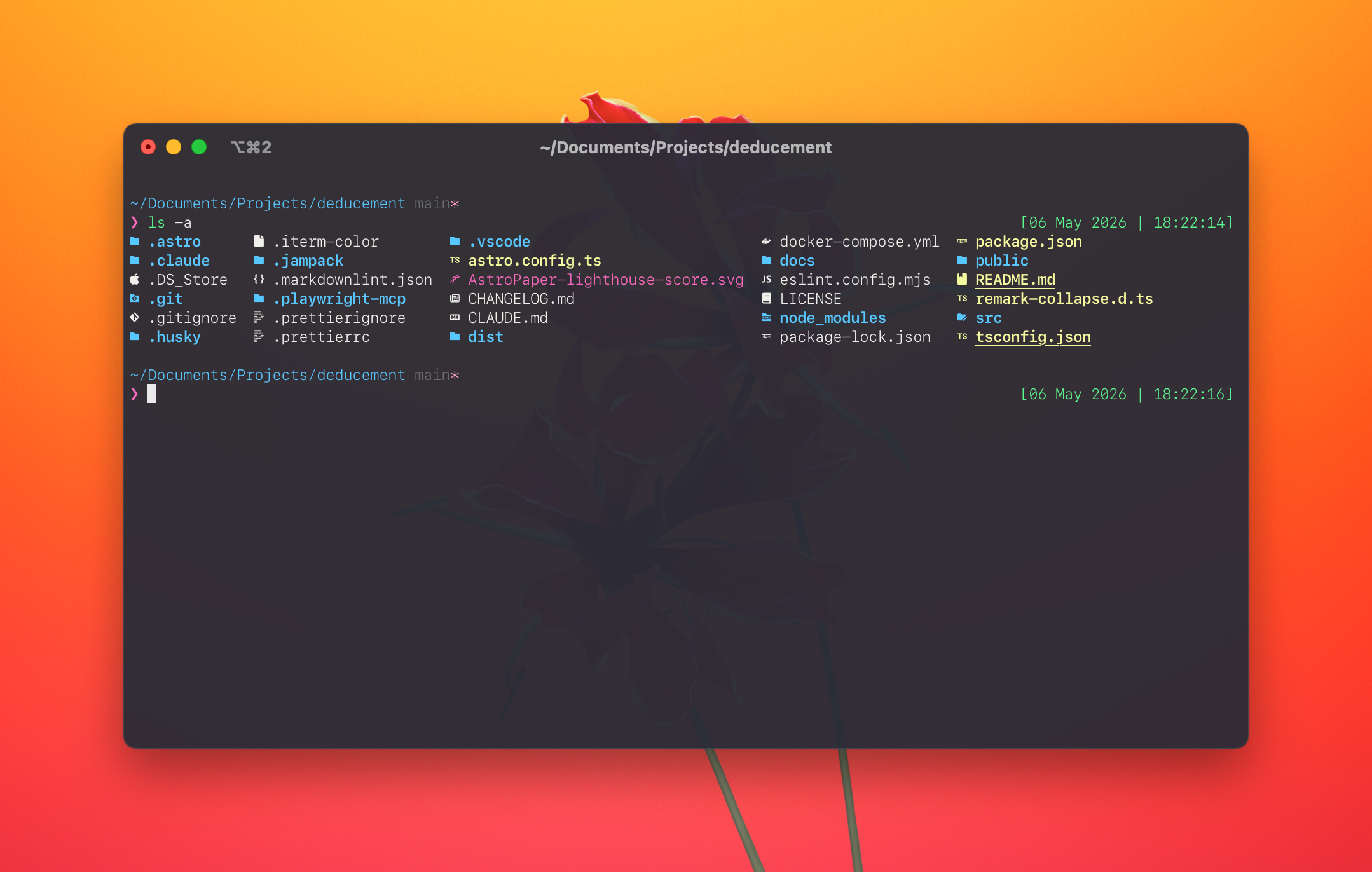 Terminal output of ls -a in the deducement project, showing eza's per-filetype icons for folders, TypeScript, JSON, Markdown, SVG, Docker, ESLint, and other files